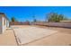 Large backyard featuring dirt, gravel, and block fencing at 3249 E Nisbet Rd, Phoenix, AZ 85032
