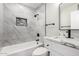 Modern bathroom featuring a shower over bath with stylish black hardware at 3249 E Nisbet Rd, Phoenix, AZ 85032