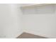 Walk-in closet features neutral carpet, baseboard, and white paint. Closet pole and shelf included at 3249 E Nisbet Rd, Phoenix, AZ 85032