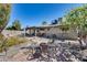 Well-maintained backyard with a lush landscape and a patio seating area at 3325 N Desoto St, Chandler, AZ 85224
