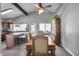 Cozy dining room features a wood table set beneath high ceilings and natural light at 3325 N Desoto St, Chandler, AZ 85224