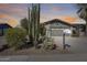 Inviting single-Gathering home with a well-manicured desert landscape and spacious two-car garage at 3325 N Desoto St, Chandler, AZ 85224