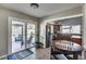 Bright kitchen and breakfast nook with stainless steel appliances and sliding doors to the patio at 3325 N Desoto St, Chandler, AZ 85224