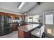 Modern kitchen with stainless steel appliances, granite countertops, and lots of natural light at 3325 N Desoto St, Chandler, AZ 85224
