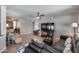Spacious living room featuring tile floors, ample seating, and a ceiling fan at 3325 N Desoto St, Chandler, AZ 85224