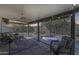 Beautiful covered patio featuring comfortable seating and a tranquil spa, perfect for relaxation at 3325 N Desoto St, Chandler, AZ 85224