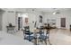 Dining area with seating for four, neutral colors, an open floorplan, and lots of natural light at 3336 E Thornton Ave, Gilbert, AZ 85297