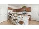 Bright kitchen featuring white countertops, stainless steel appliances, a center island with seating at 3467 S Falcon Dr, Gilbert, AZ 85297
