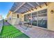 Relaxing backyard patio featuring a hammock and sliding door access to the home at 4342 E Ronald St, Gilbert, AZ 85295
