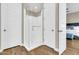 Bright bathroom featuring glass shower, wood-look tile floor and contrasting white trim and doors at 4342 E Ronald St, Gilbert, AZ 85295