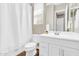 Functional bathroom with white vanity, shower curtain, and modern fixtures at 4342 E Ronald St, Gilbert, AZ 85295