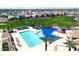 Aerial view of the community pool with palm trees and large green space at 4342 E Ronald St, Gilbert, AZ 85295