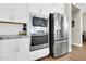 Stainless steel appliances including a microwave, oven, and refrigerator at 4342 E Ronald St, Gilbert, AZ 85295