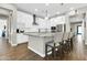 Bright kitchen with white cabinets, granite counters, subway tiles and stainless appliances at 4342 E Ronald St, Gilbert, AZ 85295