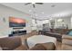 Spacious living area with hardwood floors, ceiling fan, recessed lighting, and an open layout at 4342 E Ronald St, Gilbert, AZ 85295