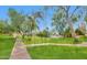 Expansive green space with mature trees and walking paths at 4705 E Winston Dr, Phoenix, AZ 85044