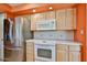 Kitchen featuring stainless steel refrigerator and modern appliances at 4705 E Winston Dr, Phoenix, AZ 85044