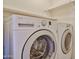 A close-up of the laundry room with washer and dryer machines at 4705 E Winston Dr, Phoenix, AZ 85044