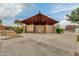 Exterior view of a community restroom with a modern metal roof and accessible design at 4832 S Ferric --, Mesa, AZ 85212