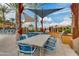 Outdoor dining area featuring multiple tables, seating, and grill stations at 4832 S Ferric --, Mesa, AZ 85212