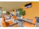 Inviting outdoor lounge area featuring comfortable seating and a flat screen tv at 4832 S Ferric --, Mesa, AZ 85212