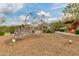 Modern playground featuring a geometric climbing structure with a soft, wood chip surface for safe play and fun at 4832 S Ferric --, Mesa, AZ 85212