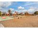 Community playground including slides, climbing structures and swings with a wood chip safety ground at 4832 S Ferric --, Mesa, AZ 85212
