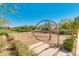 Community playground area featuring a climbing web with ample space for various activities at 4832 S Ferric --, Mesa, AZ 85212