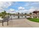 Scenic pond with seating and walking paths for relaxing outdoor enjoyment at 4832 S Ferric --, Mesa, AZ 85212
