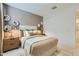 Cozy bedroom featuring a comfortable bed, stylish nightstands, and unique decor at 5027 S 233Rd Dr, Buckeye, AZ 85326