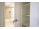 Bathroom view from inside linen closet with well-lit and neutral color palette at 5211 N 24Th St # 104, Phoenix, AZ 85016