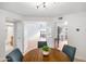Open-concept dining area showcases neutral tones, modern furnishings, and seamless flow into living spaces at 5211 N 24Th St # 104, Phoenix, AZ 85016