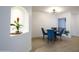 Bright dining room with modern lighting fixture, stylish furniture, and appealing decor elements at 5211 N 24Th St # 104, Phoenix, AZ 85016