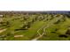 Expansive aerial view of a golf course with lush green fairways, sand traps, and mature trees at 5211 N 24Th St # 104, Phoenix, AZ 85016