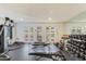 Fitness center weights, weight machines, and mirrored wall at 5211 N 24Th St # 104, Phoenix, AZ 85016