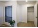 Clean, bright hallway with a window and closet space at 5211 N 24Th St # 104, Phoenix, AZ 85016