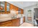 Updated kitchen showcasing modern appliances, granite countertops, and ample cabinet space at 5211 N 24Th St # 104, Phoenix, AZ 85016