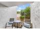 Cozy patio with neutral toned patio furniture, perfect for relaxation at 5211 N 24Th St # 104, Phoenix, AZ 85016