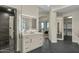 Elegant bathroom featuring a well-lit vanity and access to the shower at 6602 N Arizona Biltmore Cir, Phoenix, AZ 85016