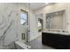 Modern bathroom featuring a glass shower, marble accents, sleek vanity, and elegant fixtures, offering a spa-like retreat at 6602 N Arizona Biltmore Cir, Phoenix, AZ 85016