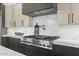Stylish kitchen equipped with marble countertops, stainless steel appliances, and custom cabinetry at 6602 N Arizona Biltmore Cir, Phoenix, AZ 85016