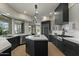 Well-appointed kitchen featuring marble island, modern cabinets, and stainless steel appliances at 6602 N Arizona Biltmore Cir, Phoenix, AZ 85016