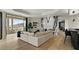 Modern living room featuring a sleek wet bar, opening to patio and mountain views at 6602 N Arizona Biltmore Cir, Phoenix, AZ 85016