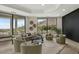 Spacious living room with comfortable seating, mountain views, and custom ceiling detail at 6602 N Arizona Biltmore Cir, Phoenix, AZ 85016