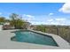 Inviting backyard pool with desert views at 6602 N Arizona Biltmore Cir, Phoenix, AZ 85016