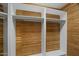 Custom wood shelving inside walk-in closet at 6602 N Arizona Biltmore Cir, Phoenix, AZ 85016