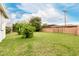 This spacious yard is surrounded by a brick wall and trees at 7844 N 17Th Ave, Phoenix, AZ 85021