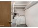 The basement laundry room includes a washer, dryer, and utility sink at 7844 N 17Th Ave, Phoenix, AZ 85021