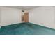 Bright bedroom with white walls, a functional closet, and plush green carpeting at 7844 N 17Th Ave, Phoenix, AZ 85021