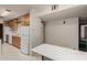 Functional kitchen with white appliances, wood cabinets, and ample counter space at 7844 N 17Th Ave, Phoenix, AZ 85021